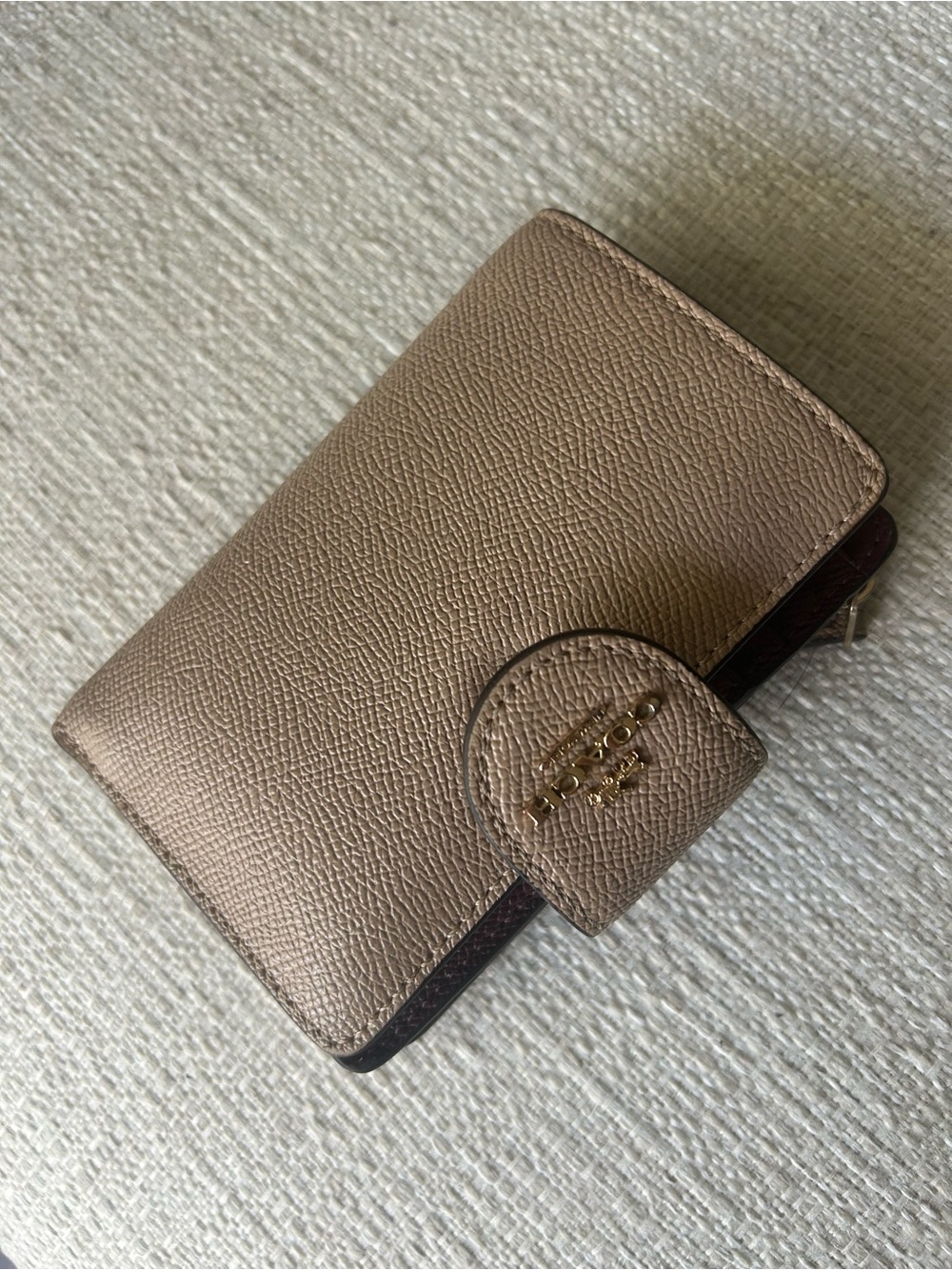 Coach Pebbled Leather Compact Wallet in Taupe with Gold Logo